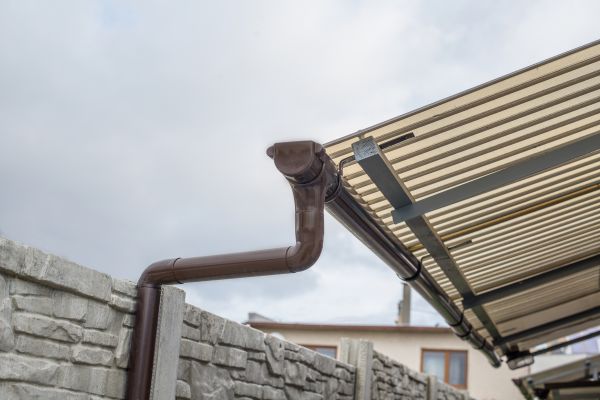 Plastic Downspout Installation in Southern Pines